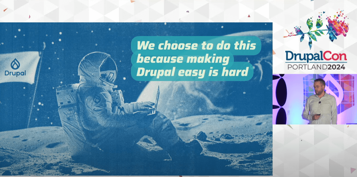 A slide with an astronaut on the Moon, Drupal flag, and a quote by Dries.