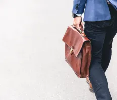 man walking with briefcase