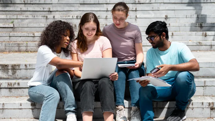 Students sitting on stairs