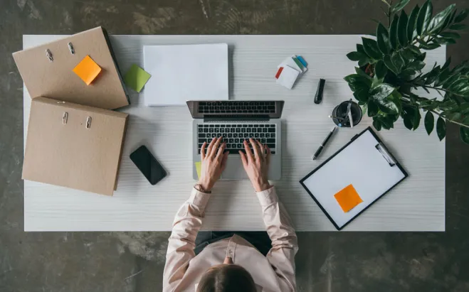 overhead view of laptop on table