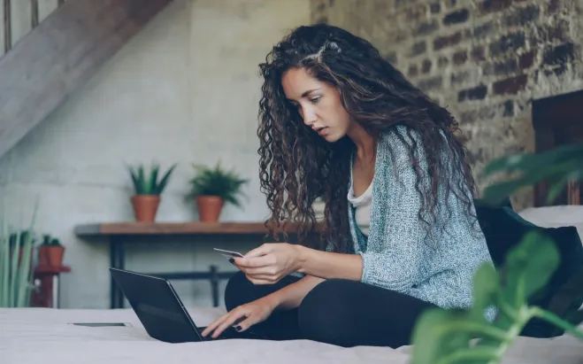 woman paying for online purchase
