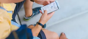 person looking at cell phone