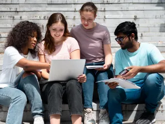 Students sitting on stairs