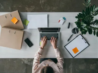 overhead view of laptop on table