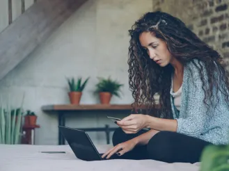 woman paying for online purchase