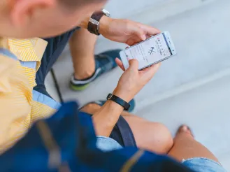 person looking at cell phone