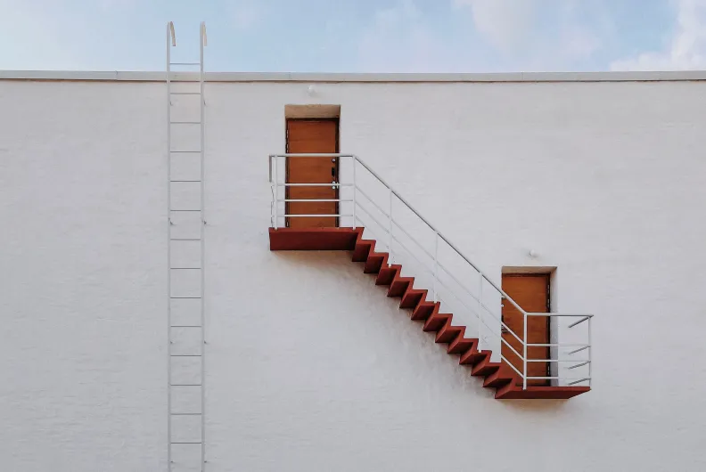 Two doors connected by a staircase