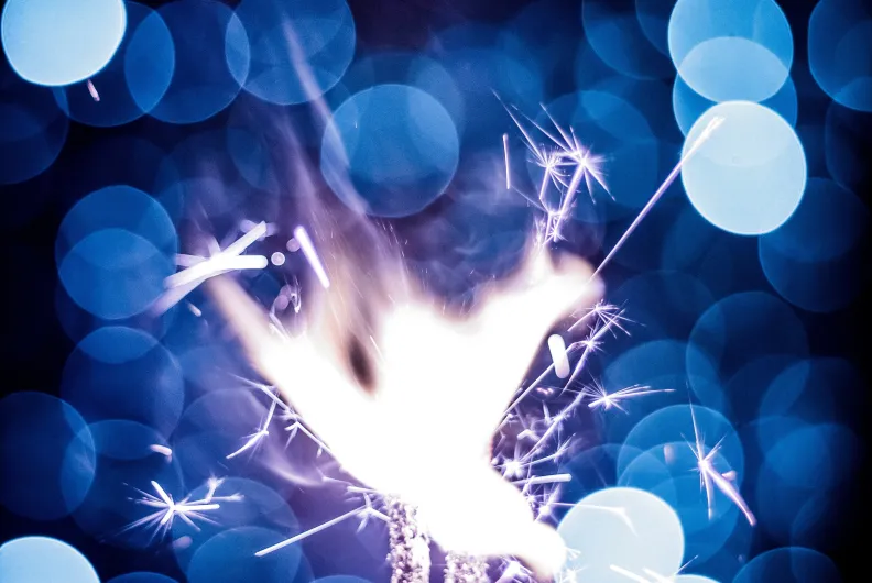 Person holding sparkler