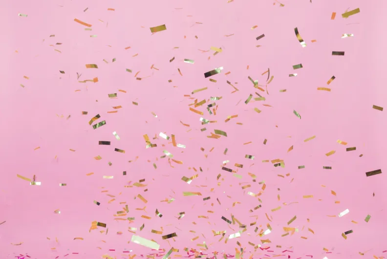 Confetti on pink background