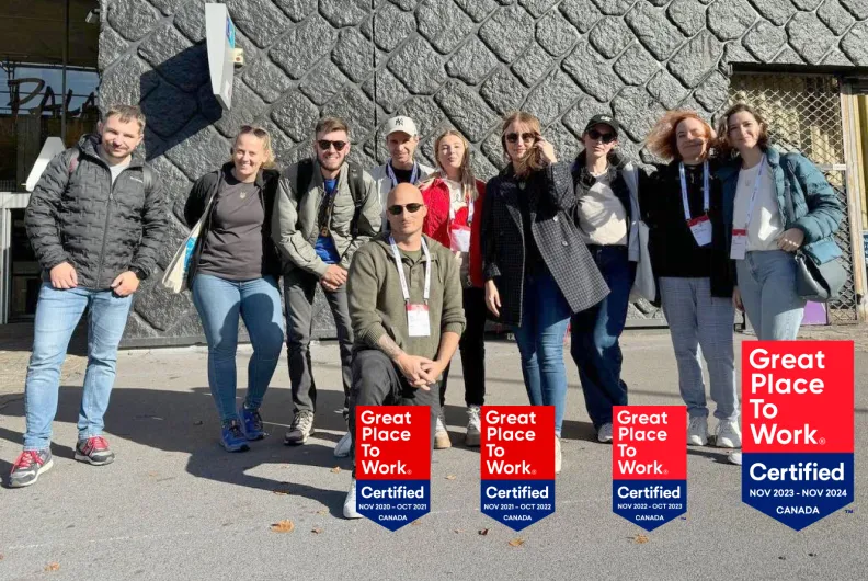 Team photo with GPTW badges