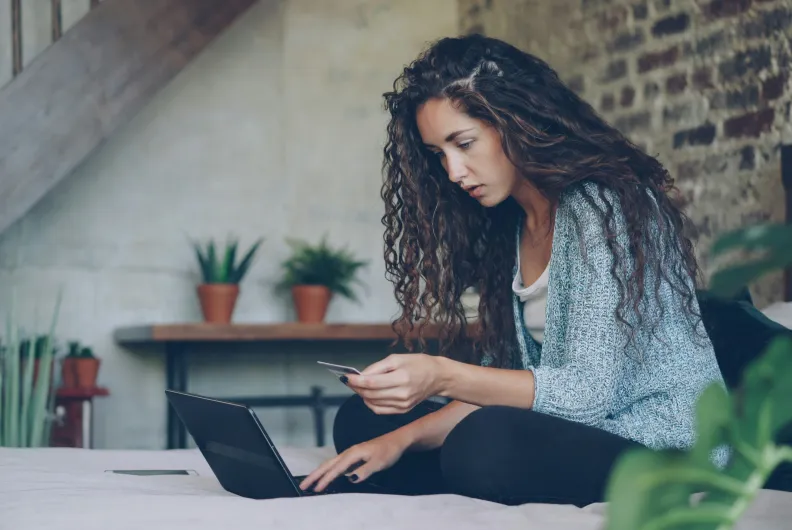 woman paying for online purchase